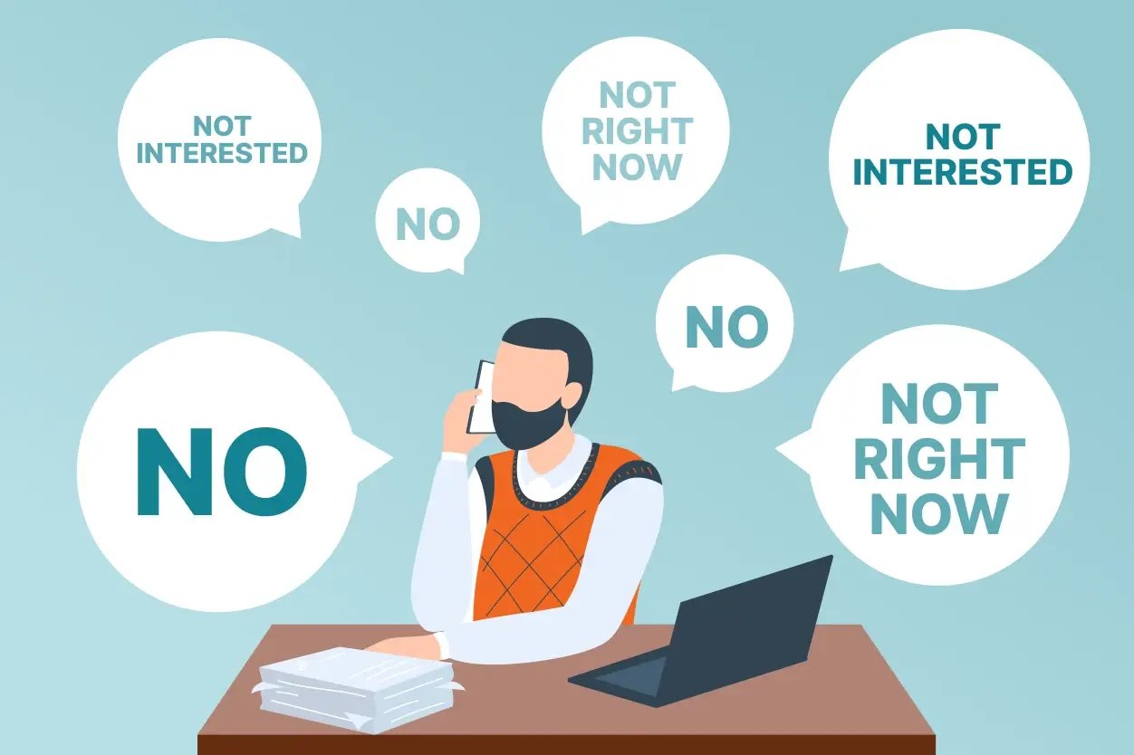 The agent is surrounded by multiple speech bubbles saying “No,” “Not Interested,” and “Not Right Now,” but continues to prospect.